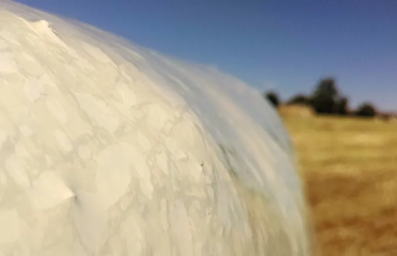 Evaluation du liage des balles par film plastique